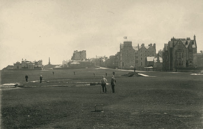 The Old Course at St Andrews in 1891, with golfers crossing the links and the town beyond